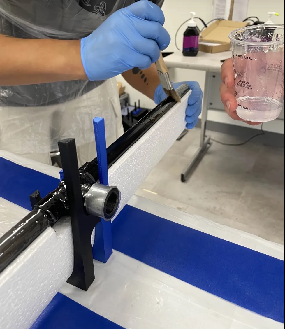 Resining the carbon fiber tubing to the foam wing